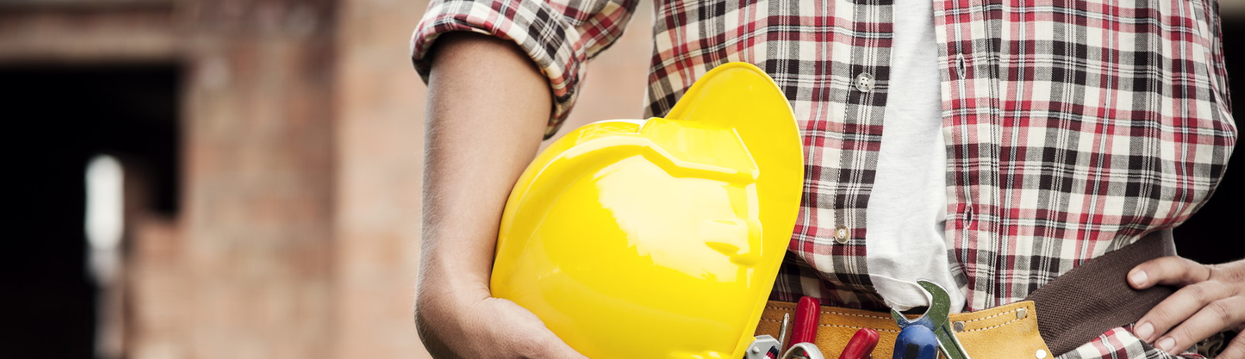 a family sitting in the grass