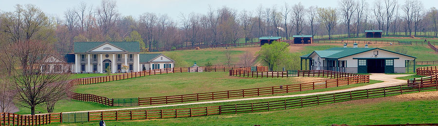 distant view of farm houses and farmland